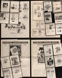 8x084 LOT OF 23 FOLDED & UNFOLDED CUT PRESSBOOKS '50s-70s advertising from Eastwood movies & more!