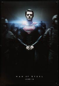 9a509 MAN OF STEEL teaser DS 1sh '13 Henry Cavill in the title role as Superman in handcuffs!