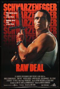 9a604 RAW DEAL 1sh '86 great close up of tough guy Arnold Schwarzenegger with gun!