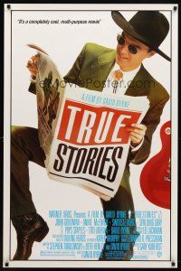 9a767 TRUE STORIES 1sh '86 image of star & director David Byrne reading newspaper!