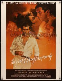 9c245 YEAR OF LIVING DANGEROUSLY 30x40 '83 Peter Weir, great artwork of Mel Gibson by Stapleton!