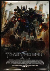 9c533 TRANSFORMERS: DARK OF THE MOON DS bus stop '11 Michael Bay, Shia LaBeouf, cool image!