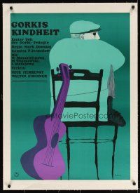 9d099 CHILDHOOD OF MAXIM GORKY linen German R1964 artwork of man in chair with guitar by Jan Lenica!