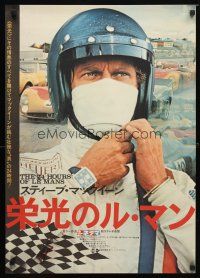 9e346 LE MANS helmet style Japanese '71 best c/u of race car driver Steve McQueen adjusting helmet!