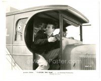 9t630 I COVER THE WAR 8x10 still '37 bullet narrowly misses young John Wayne in truck!