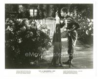 9t644 IT'S A WONDERFUL LIFE TV 8x10 still R60s James Stewart hands clothes to Donna Reed in bush!