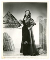 9t849 RITA HAYWORTH 8x10 still '56 the beautiful star in great dress over Egyptian background!