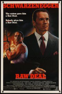 9w630 RAW DEAL 1sh '86 art of tough guy Arnold Schwarzenegger with gun & in suit!