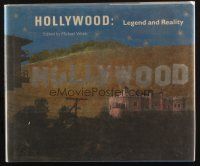 1c117 HOLLYWOOD: LEGEND & REALITY hardcover book '86 illustrated history of films & movie artwork!