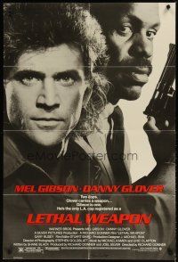 1g479 LETHAL WEAPON 1sh '87 great close image of cop partners Mel Gibson & Danny Glover!