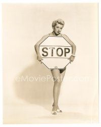 1h671 MERRY ANDERS 7.25x9 still '50s sexy portrait covering her skimpy outfit with a stop sign!