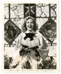 1h778 RITA CORDAY 8x10 still '47 singing in church as Paule Croset, her first Hollywood Easter!