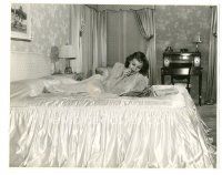 1h779 RITA HAYWORTH 7.75x9.75 still '41 great close up reading & snacking on her bed at home!
