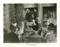 1h831 SHANGHAI 8x10 still '35 Loretta Young holding fur coat looks at men raising their hands!