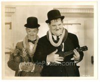 1h861 SONS OF THE DESERT 8x10 still '33 Stan Laurel holding pineapples & Oliver Hardy w/ukulele!