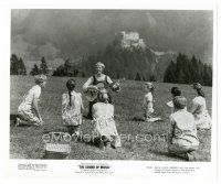 1h863 SOUND OF MUSIC 8x10 still '65 c/u of Julie Andrews playing guitar in circle of children!