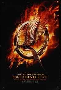 1j329 HUNGER GAMES: CATCHING FIRE teaser DS 1sh '13 every revolution begins with a spark!