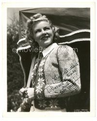 1r0514 CLAIRE TREVOR signed 8x10 still '40s great smiling close up wearing sweater & holding flower!
