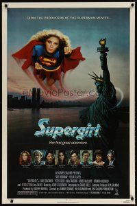 2b753 SUPERGIRL 1sh '84 super Helen Slater in costume flying over Statue of Liberty!