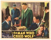 2k668 MAN WHO CRIED WOLF LC '37 two guys watch Robert Gleckler in suit pointing at Tom Brown!