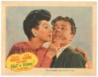 2k965 WHAT A WOMAN LC '43 close up of Rosalind Russell embracing Willard Parker!