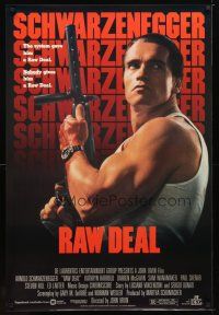 2m618 RAW DEAL 1sh '86 great close up of tough guy Arnold Schwarzenegger with gun!