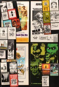 2s064 LOT OF 29 UNCUT PRESSBOOKS '60s-80s great advertising images from a variety of movies!