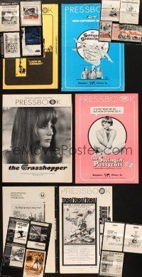 2s069 LOT OF 21 UNCUT PRESSBOOKS '60s-70s advertising from a variety of different movies!