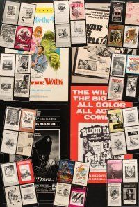 2s118 LOT OF 44 UNCUT PRESSBOOKS '40s-80s great advertising images from a variety of movies!