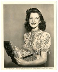2x725 PEGGY RYAN 8x10 still '44 great smiling close up holding a box full of war bonds!