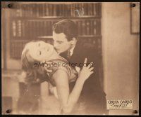 2y057 KISS jumbo LC '29 close up of Greta Garbo resisting Lew Ayres' passionate embrace!