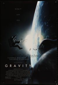 2z315 GRAVITY October style advance DS 1sh '13 Sandra Bullock, George Clooney, adrift over Earth!