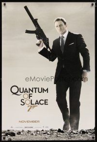 2z617 QUANTUM OF SOLACE teaser 1sh '08 Daniel Craig as Bond with H&K submachine gun!
