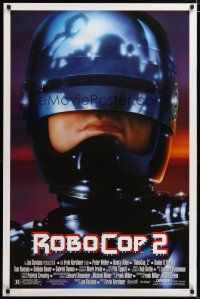 2z641 ROBOCOP 2 1sh '90 great close up of cyborg policeman Peter Weller, sci-fi sequel!