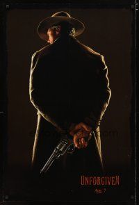 2z784 UNFORGIVEN dated DS teaser 1sh '92 classic image of gunslinger Clint Eastwood w/back turned!