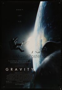 3f311 GRAVITY October style advance DS 1sh '13 Sandra Bullock, George Clooney, adrift over Earth!