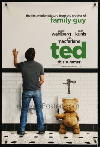 3f760 TED teaser DS 1sh '12 image of Mark Wahlberg & teddy bear at urinals, hilariously wacky!