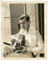 3k161 CLARK GABLE 8x10.25 still '40s seated smiling portrait holding cool camera!