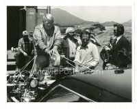 3k201 DIRTY HARRY candid 8x10.25 still '71 Clint Eastwood watches crew set up camera on car's hood!