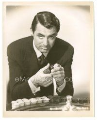 3k627 MR. LUCKY 8x10.25 still '43 great portrait of gambler Cary Grant with stacks of chips!