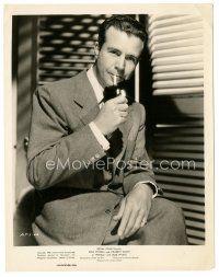 3k710 PITFALL 8x10.25 still '48 portrait of Dick Powell in suit & tie lighting his cigarette!