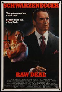 3p634 RAW DEAL 1sh '86 art of tough guy Arnold Schwarzenegger with gun & in suit!