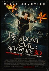 3r112 RESIDENT EVIL: AFTERLIFE advance DS 1sh '10 cool image of Milla Jovovich with guns blazing!