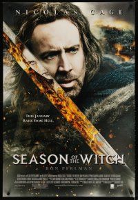 3r119 SEASON OF THE WITCH advance DS 1sh '11 close image of Nicolas Cage & flaming sword!