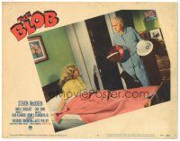 3w227 BLOB LC #6 '58 woman on bed watches old man in pajamas take out Civil Defense helmet!