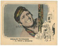3w199 THIEF OF BAGDAD LC '24 best super close up of Douglas Fairbanks smiling really big!