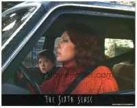 3y848 SIXTH SENSE LC '99 c/u of Toni Collette & Haley Joel Osment in car, M. Night Shyamalan!