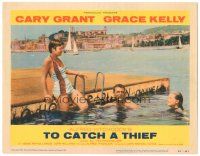 3y911 TO CATCH A THIEF LC #1 '55 Grace Kelly & Cary Grant swim on the Riviera, Alfred Hitchcock