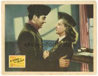 3y988 YANK IN THE R.A.F. LC '41 close up of Tyrone Power smiling at Betty Grable in uniform!
