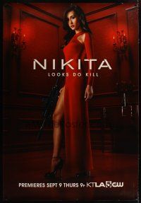 3z228 NIKITA DS bus stop '10 full-length image of sexy Maggie Q in slinky red dress!